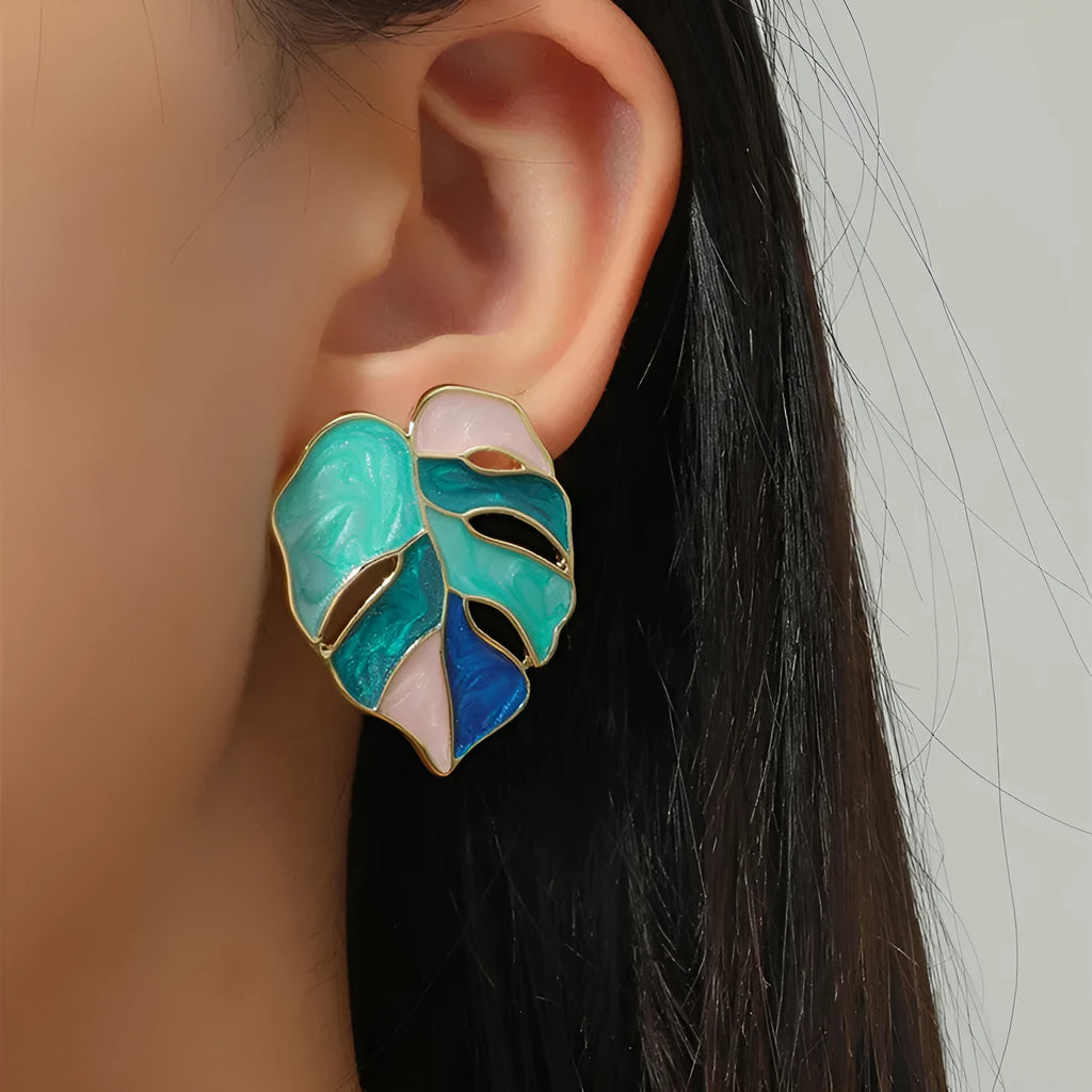 Maple leaf stud earrings with handmade drop oil finish, electroplated alloy, available in green or pink.