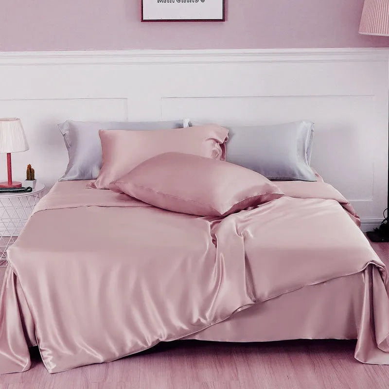 Double-sided solid colour silk duvet cover shown in multiple colour options.