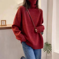 Women's loose turtleneck sweater with a thick curling pile collar in a choice of four colours.