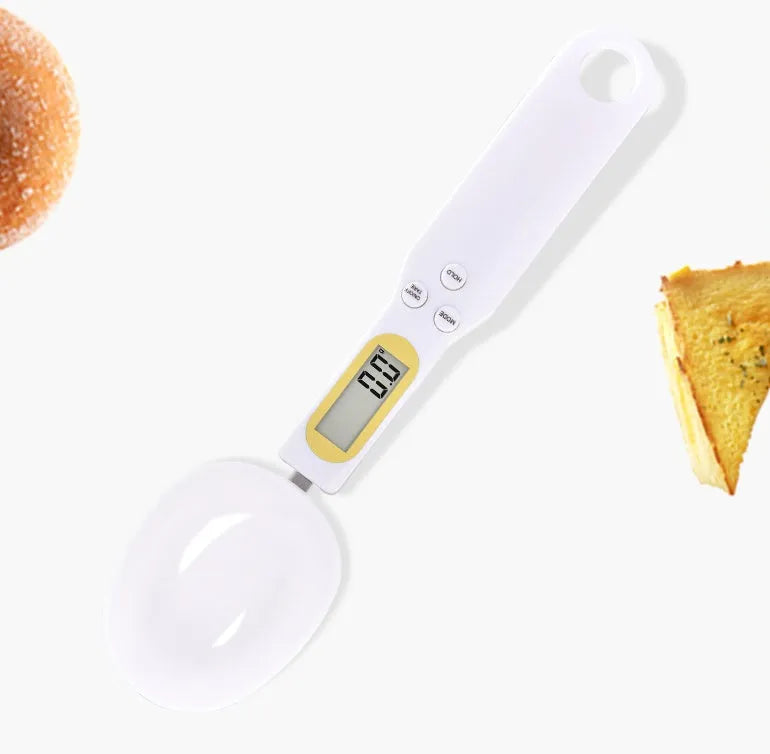 Black electronic measuring spoon scale with digital display on handle and integrated spoon bowl.