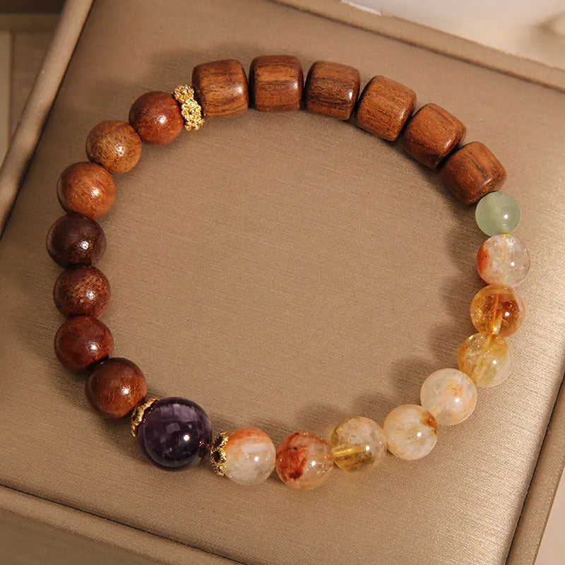 Women's bracelet with pineapple yellow tower crystal, ebony amethyst tones, pearl and rhinestone decorative elements