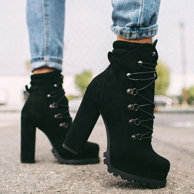 Women's suede ankle boots with thick high heel, round toe, and Roman boot styling in multiple colours
