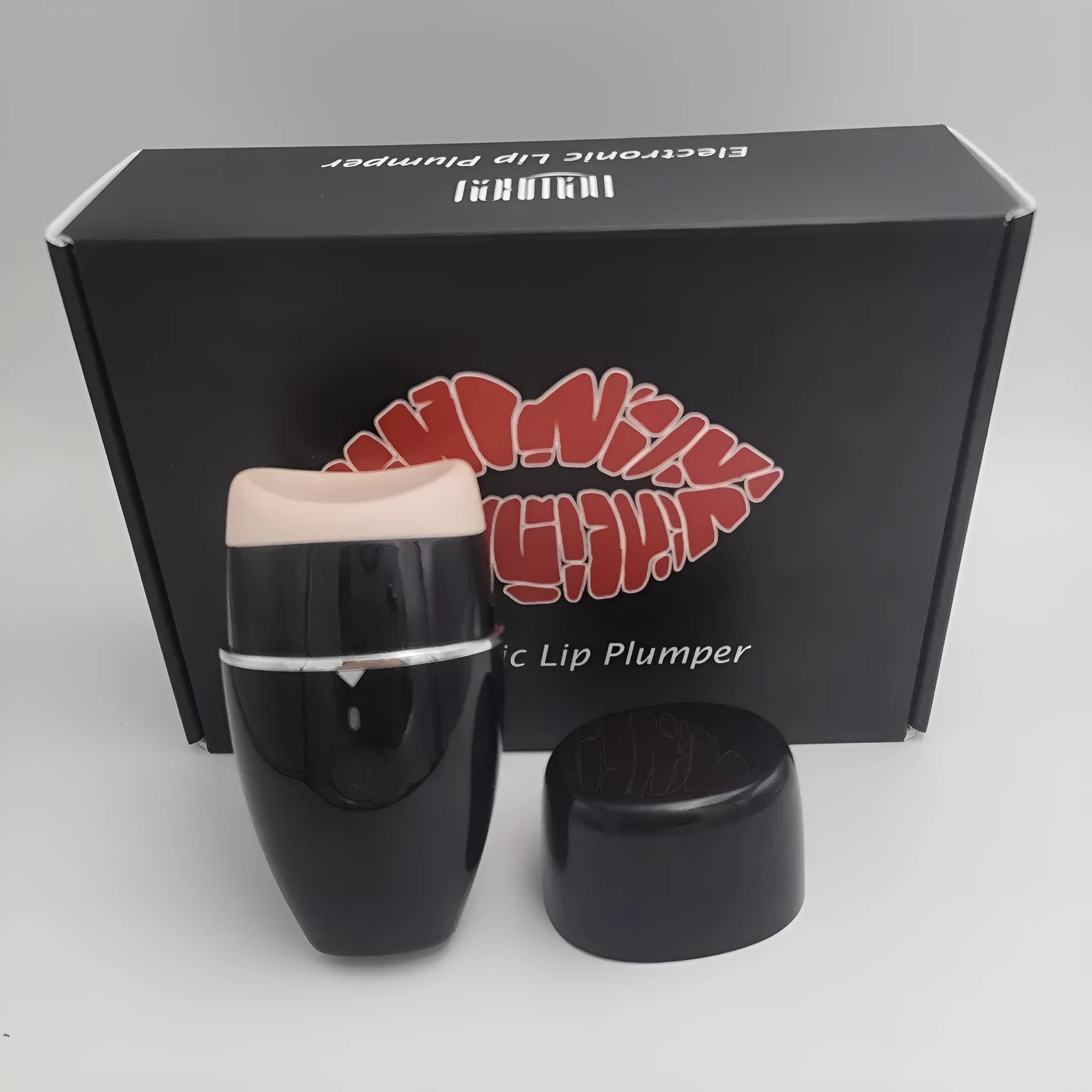 Electric silicone lip plumper device with 3-speed adjustment in black or white colour