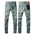 Men's black slim fit skinny jeans with a straight leg and button fly detail.