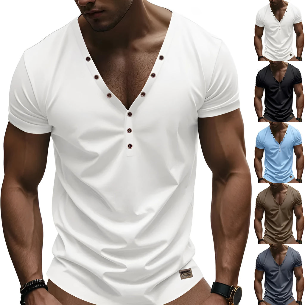 Man wearing a loose fit grey v-neck pullover top with button detail on the neckline