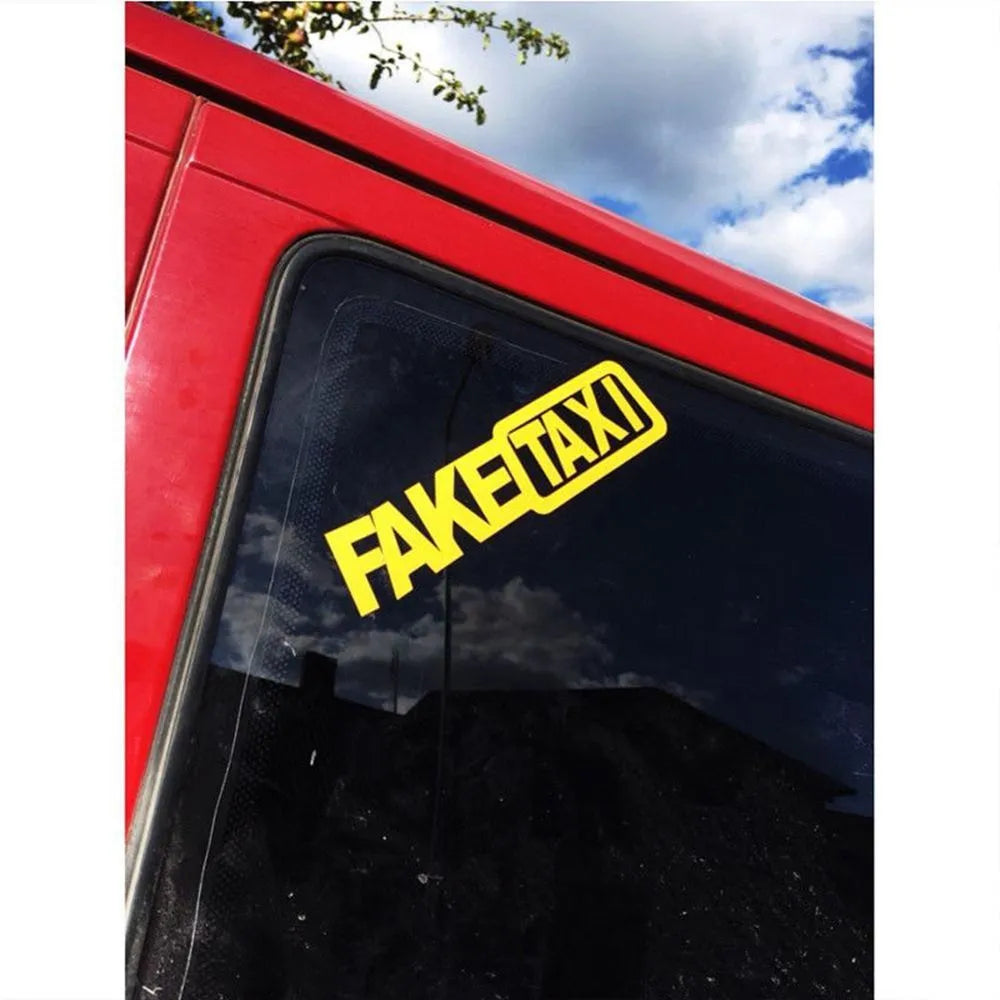 Fake Taxi drifting sign funny car sticker in black, 20x4.8cm on a car panel