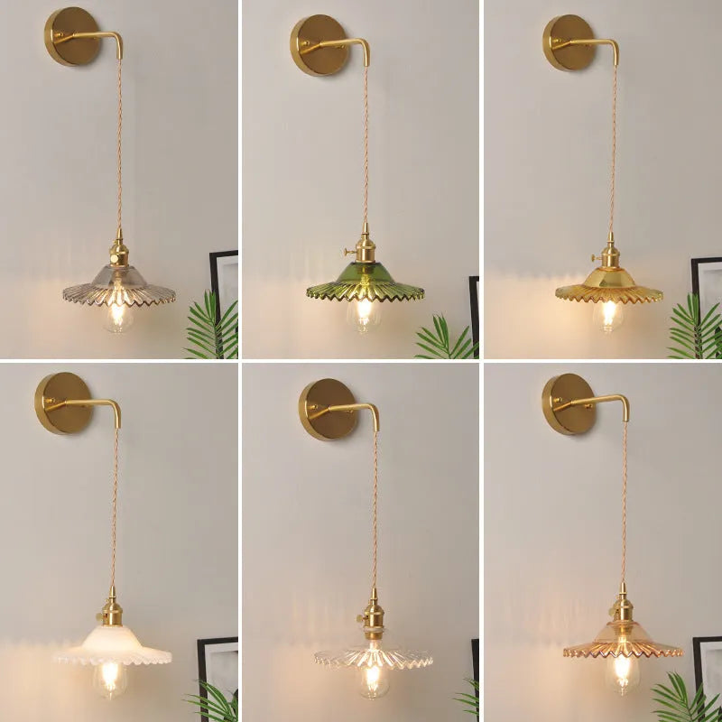 Retro brass bedside lotus wall lamp with glass shade in transparent finish, copper body, 22cm diameter