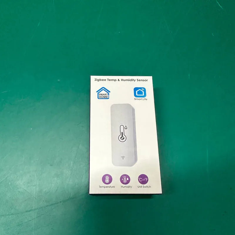 White rectangular WiFi temperature and humidity sensor with compact dimensions for smart home monitoring