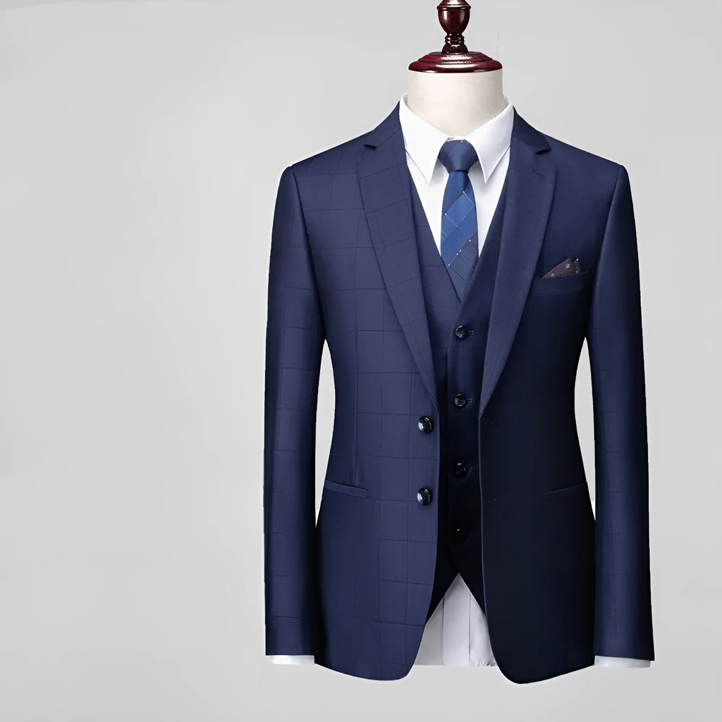 Men's navy blue plaid slim fit three-piece suit with vest, jacket, and trousers for business casual wear