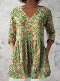 Women's printed loose dress with 3/4 sleeves and wide waist in colourful pattern