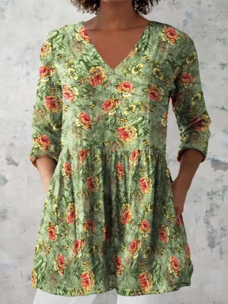 Women's printed loose dress with 3/4 sleeves and wide waist in colourful pattern