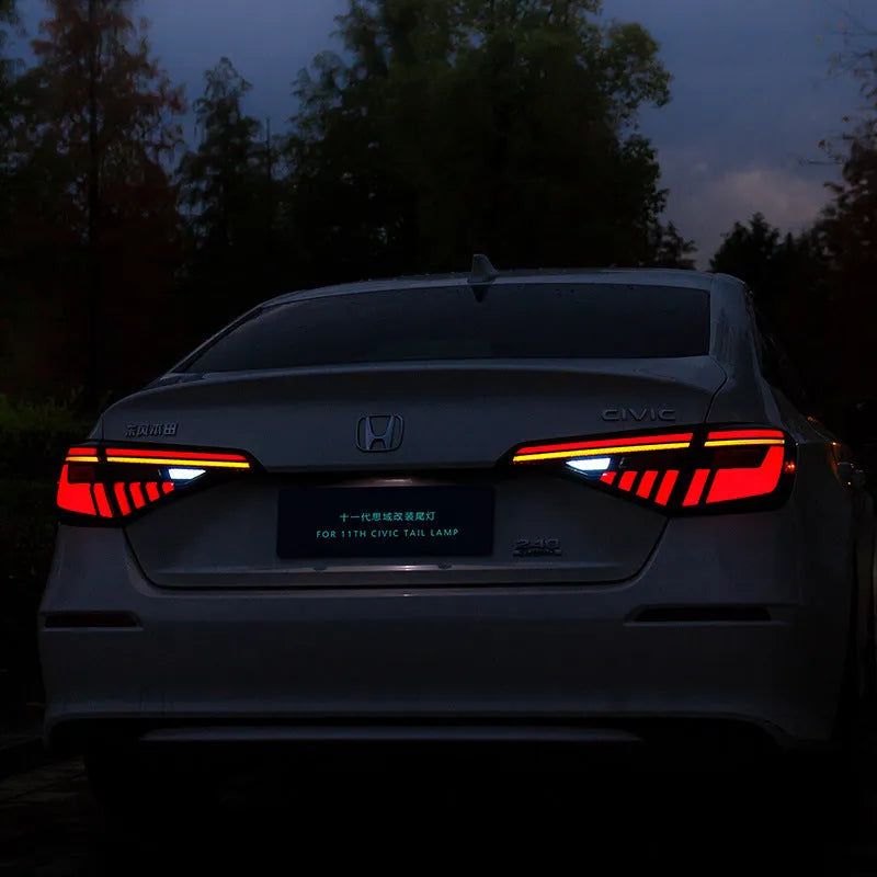 11th generation Honda Civic black and red LED tail light assembly with sequential indicators