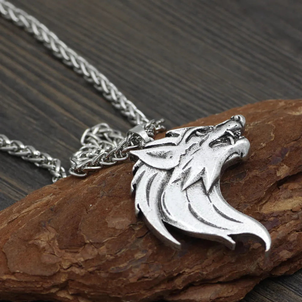 Men's wolf head pendant necklace in ancient silver or ancient bronze on a 58cm BS chain, Viking-style amulet.