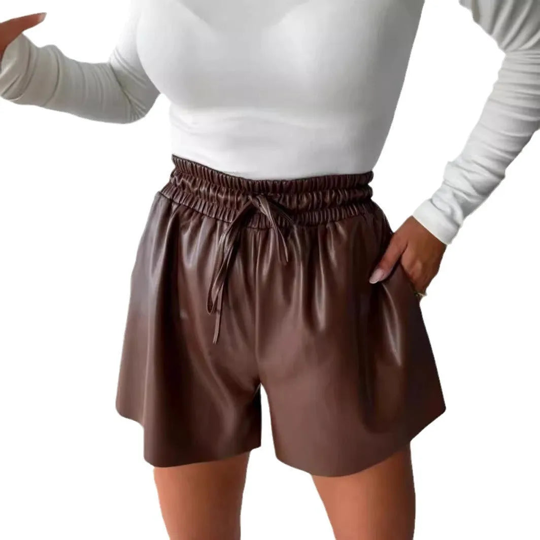 Women's black casual shorts with drawstring lace-up waist and wide-leg design