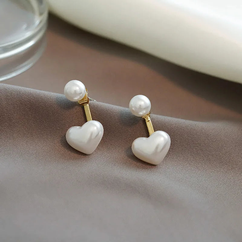 Heart-shaped alloy stud earrings with electroplated finish and artificial gem inlays in Korean style