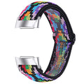 Printed elastic watch strap for Fitbit Charge 6 showing rainbow pattern design