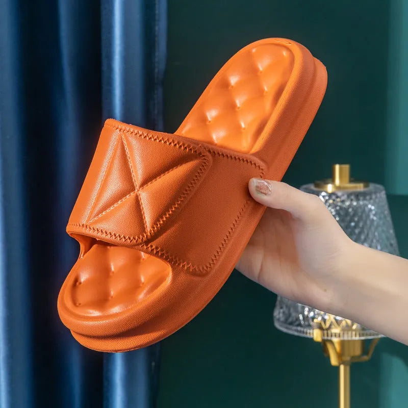 A pair of soft EVA bathroom slippers with a non-slip sole, shown in a selected colour.