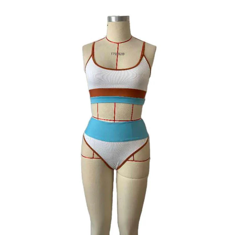 Women's solid colour quick-drying swimwear set with top and shorts for swimming