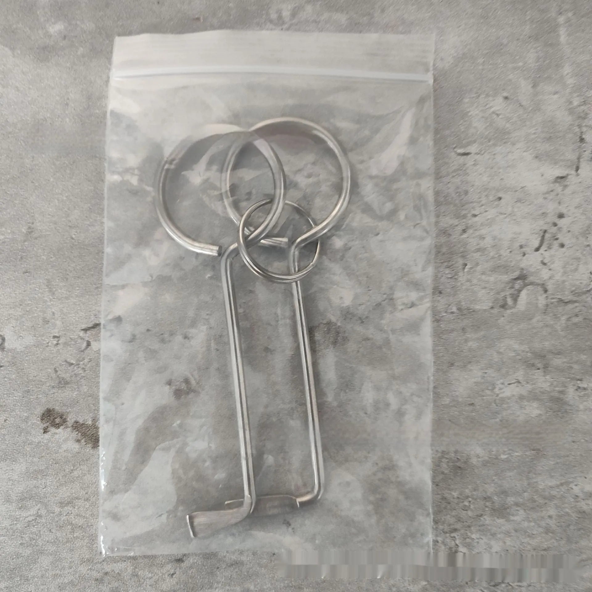Two alloy steel wrench tools from a portable 2-piece universal tool set.