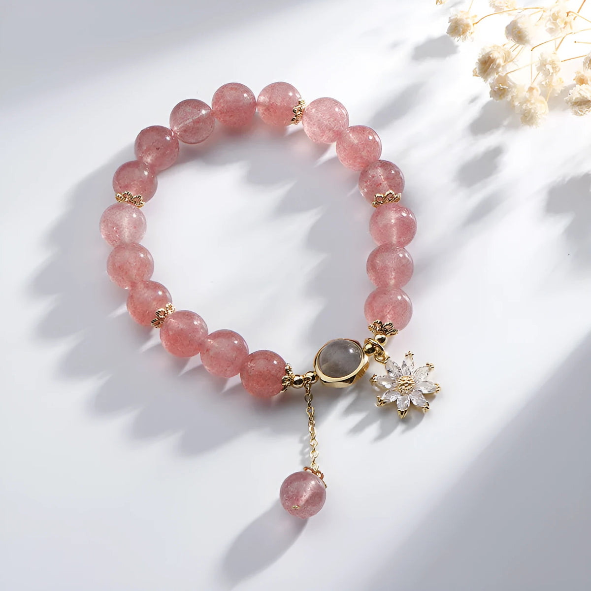 Strawberry quartz crystal bracelet with floral design elements in Mori style