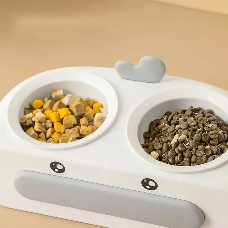 Duck design double pet bowl feeder tray in grey, pink, or yellow with plastic or stainless steel bowls for cats and small dogs.