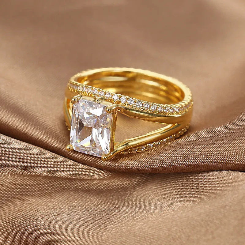 Gold geometric women's ring with square zircon stone shown in European simple luxury design