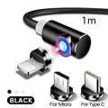 Black L-shaped magnetic charging cable with aluminium connector and LED light next to phone
