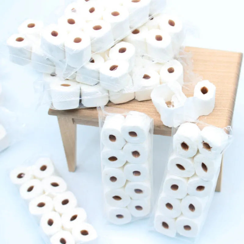 Simulated tissue roll paper toy model measuring 30x15x80mm for children's pretend play