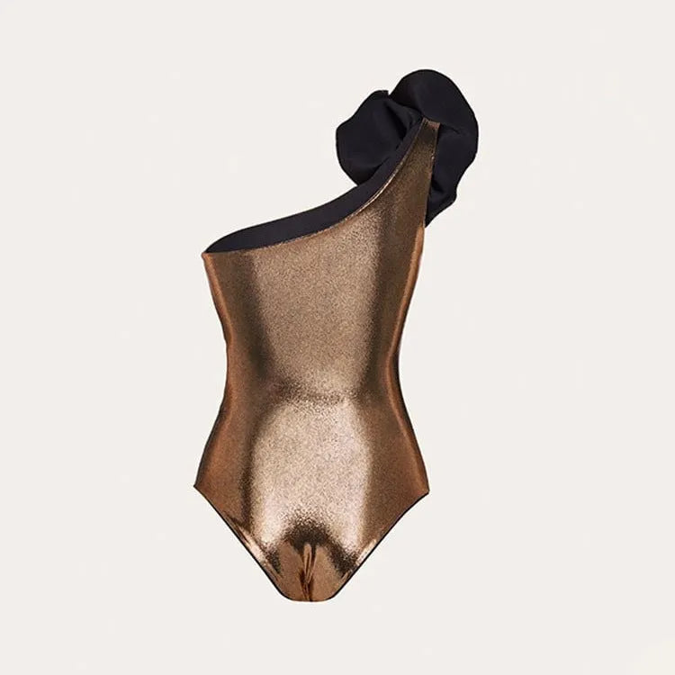 Gold coloured one-piece swimsuit with a halter neck and hollow-out design on a mannequin.
