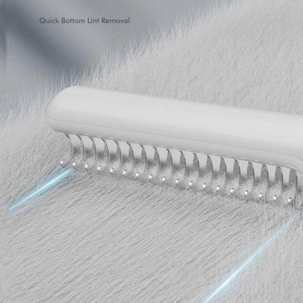 Stainless steel pet dematting comb with handle for removing knots and mats from dog's coat.