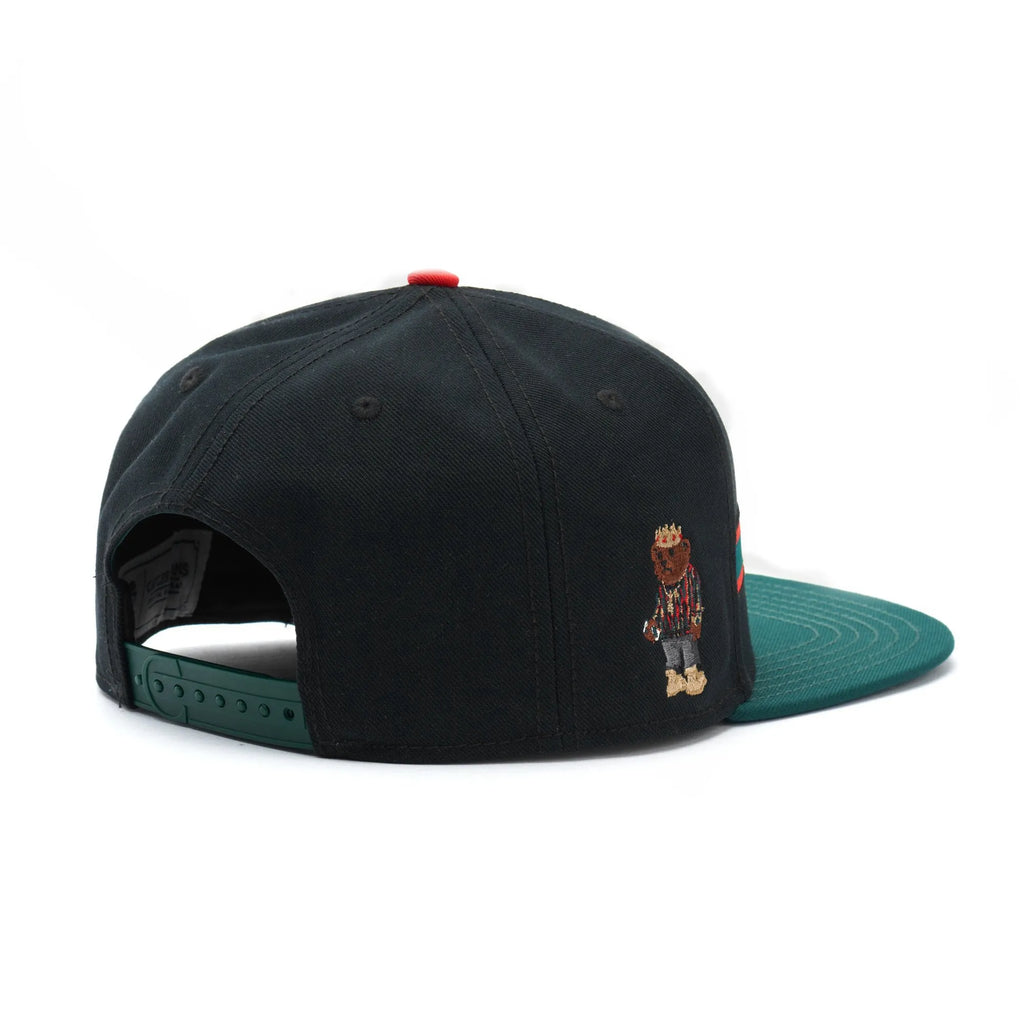 Black canvas embroidered baseball cap with dome shape and adjustable back closure