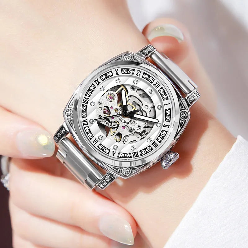 Men's mechanical analogue watch with luminous hands on a leather strap, shown in multiple colour options.