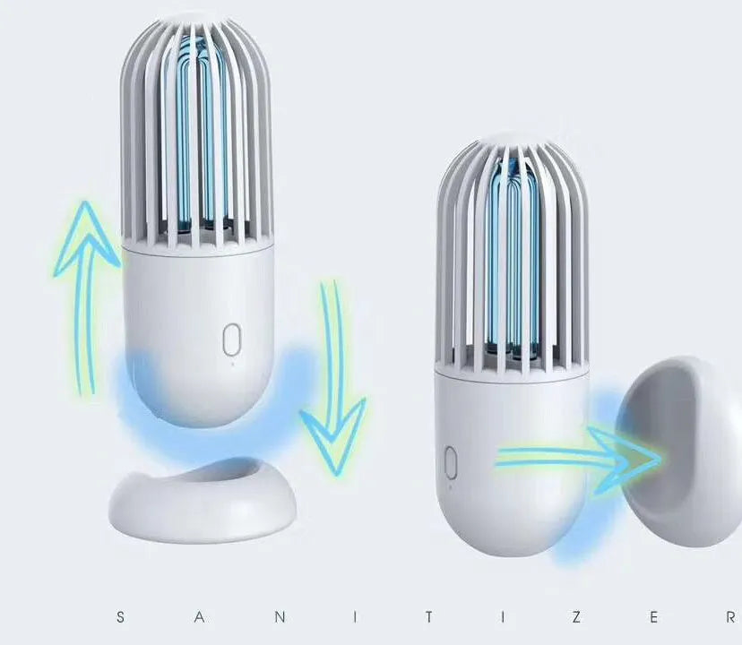 Portable capsule-shaped ultraviolet UVC disinfection lamp in black, showing compact size.
