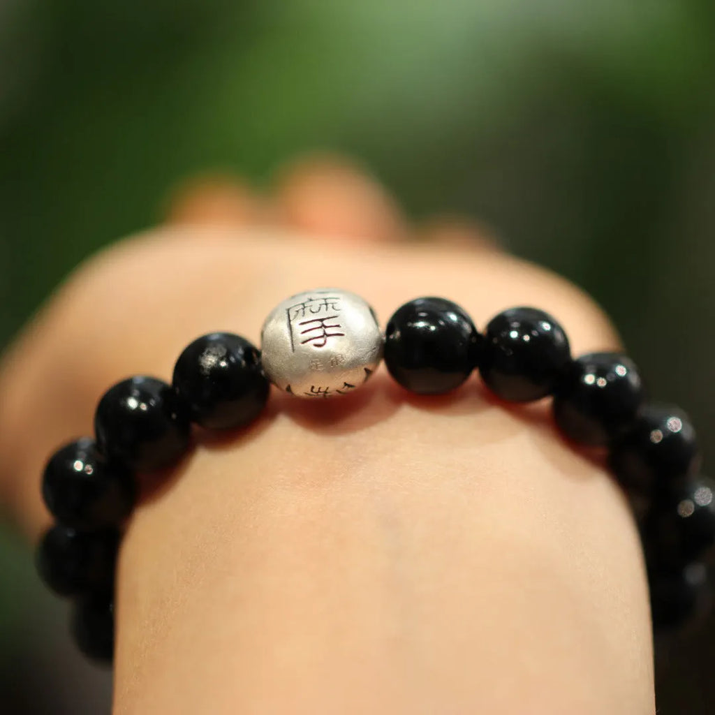 10mm black agate beads on sterling silver bracelet with Chinese style design