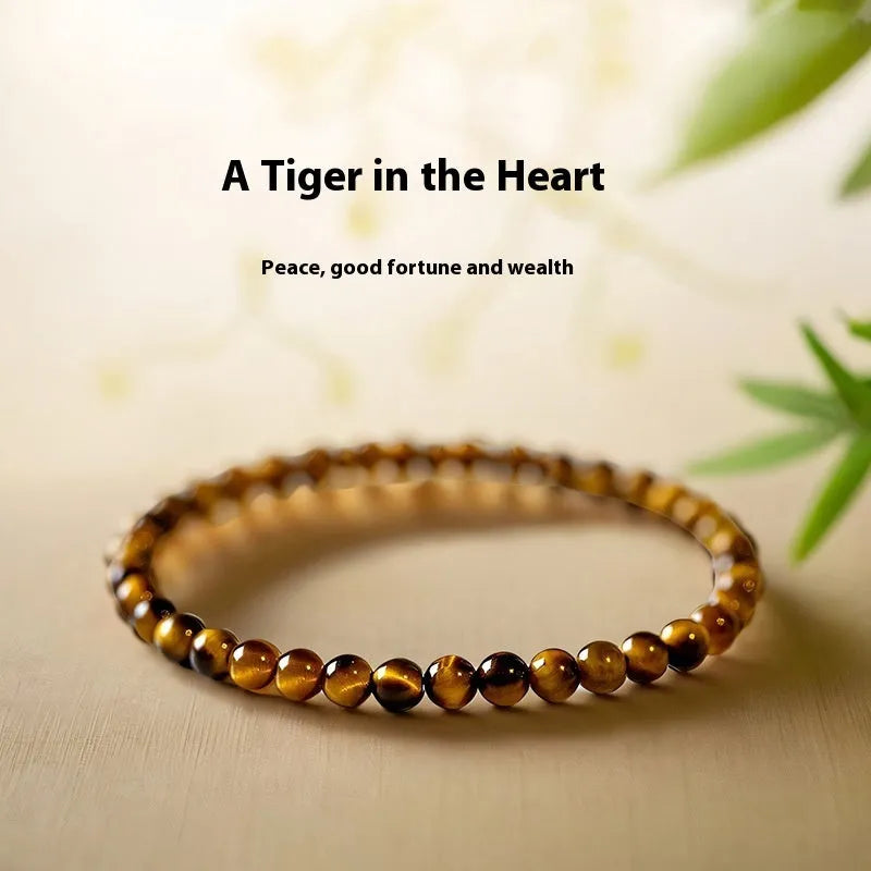 Tigereye stone bracelet with geometric design in New Chinese style showing round beads