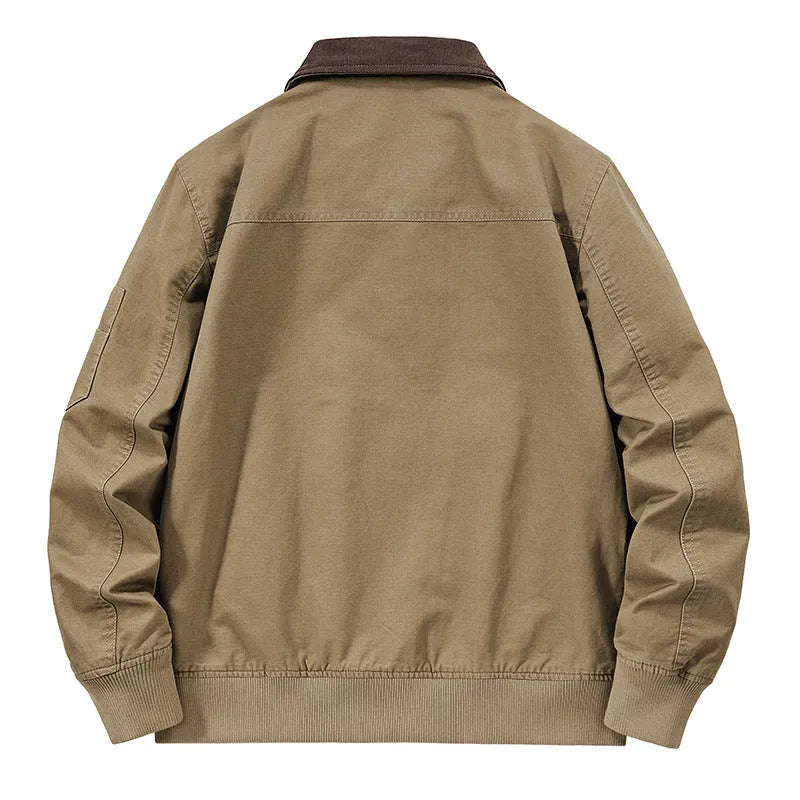Men's camel coloured washed cotton baseball-style flight jacket on a hanger