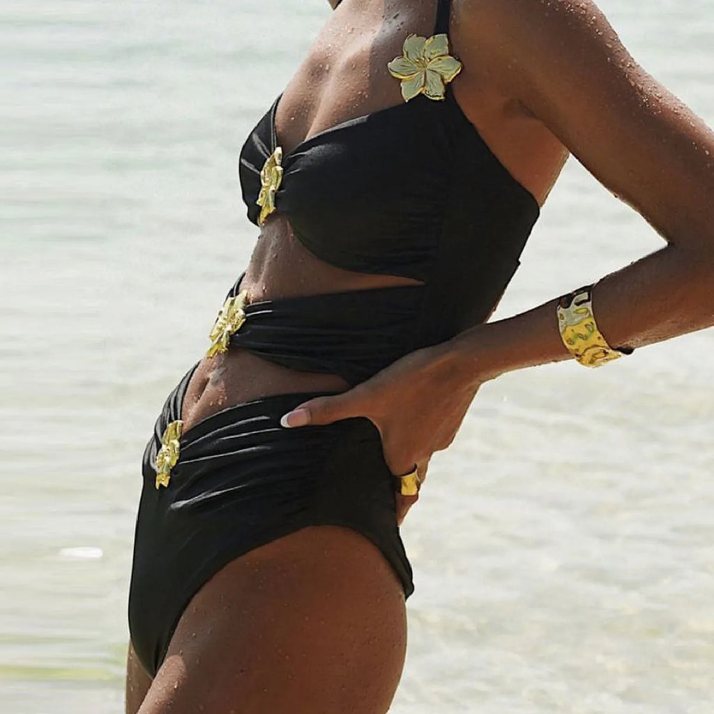Women's solid colour one-piece swimsuit with high waist, hollow-out tube top, and a matching detachable short skirt.
