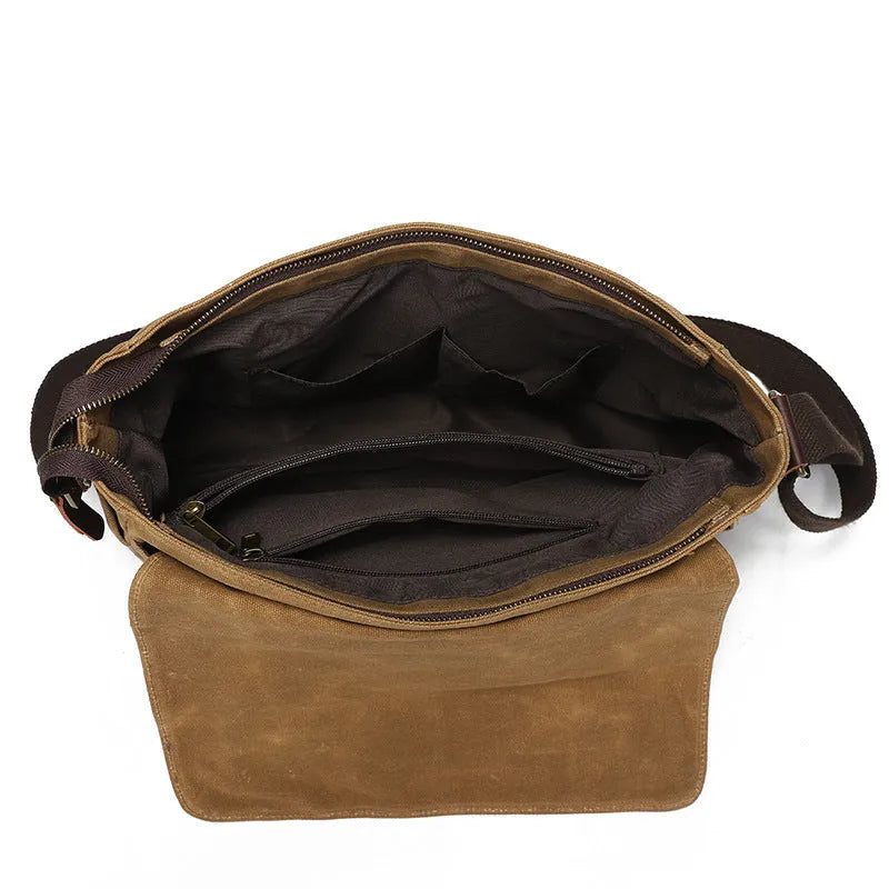Water-repellent waxed camera shoulder bag in canvas and first layer cowhide leather with curved shoulder strap