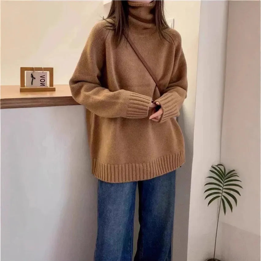 Women's loose turtleneck sweater with a thick curling pile collar in a choice of four colours.