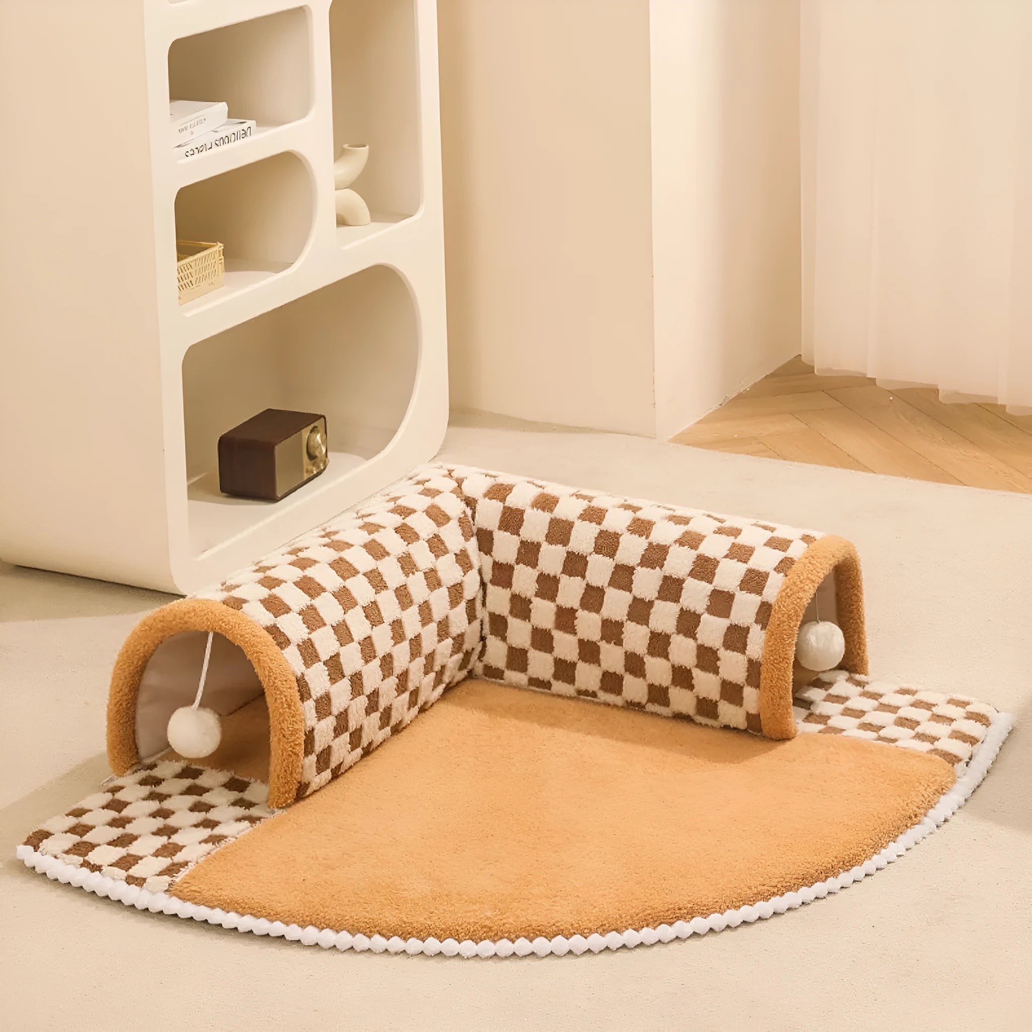 Fan-shaped plush pet bed with integrated tunnel in coffee colour, showing thick mat and anti-slip base.
