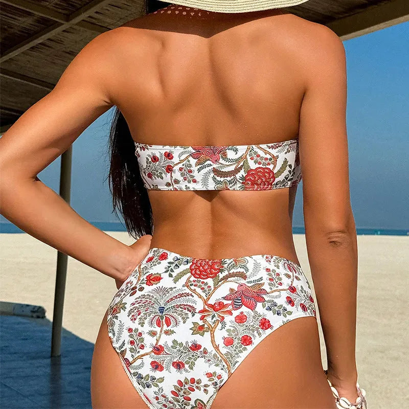 Women's printed bandeau triangle top and matching swim shorts on a mannequin.