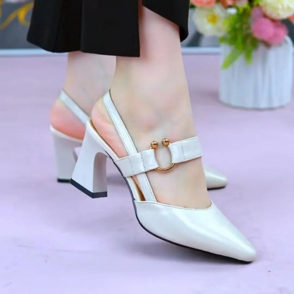 Women's apricot coloured pigskin leather sandals with a closed toe, back, and chunky heel.