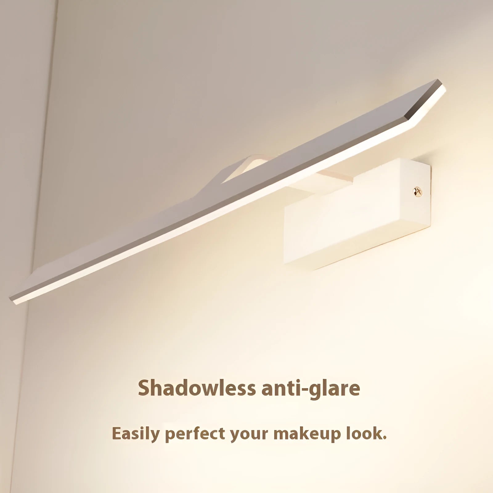 White wall-mounted LED mirror headlight with integrated mirror surface, shown in a bathroom setting.