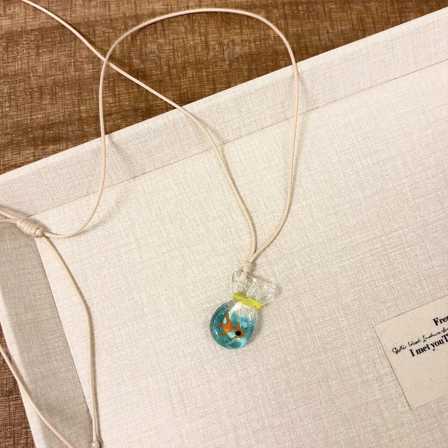 Women's coloured glaze pendant necklace on cotton linen clavicle chain with world style design