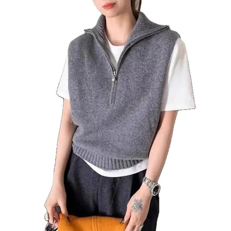 Retro half zip sleeveless knit vest in mesh polyester fabric showing 3D pattern detail