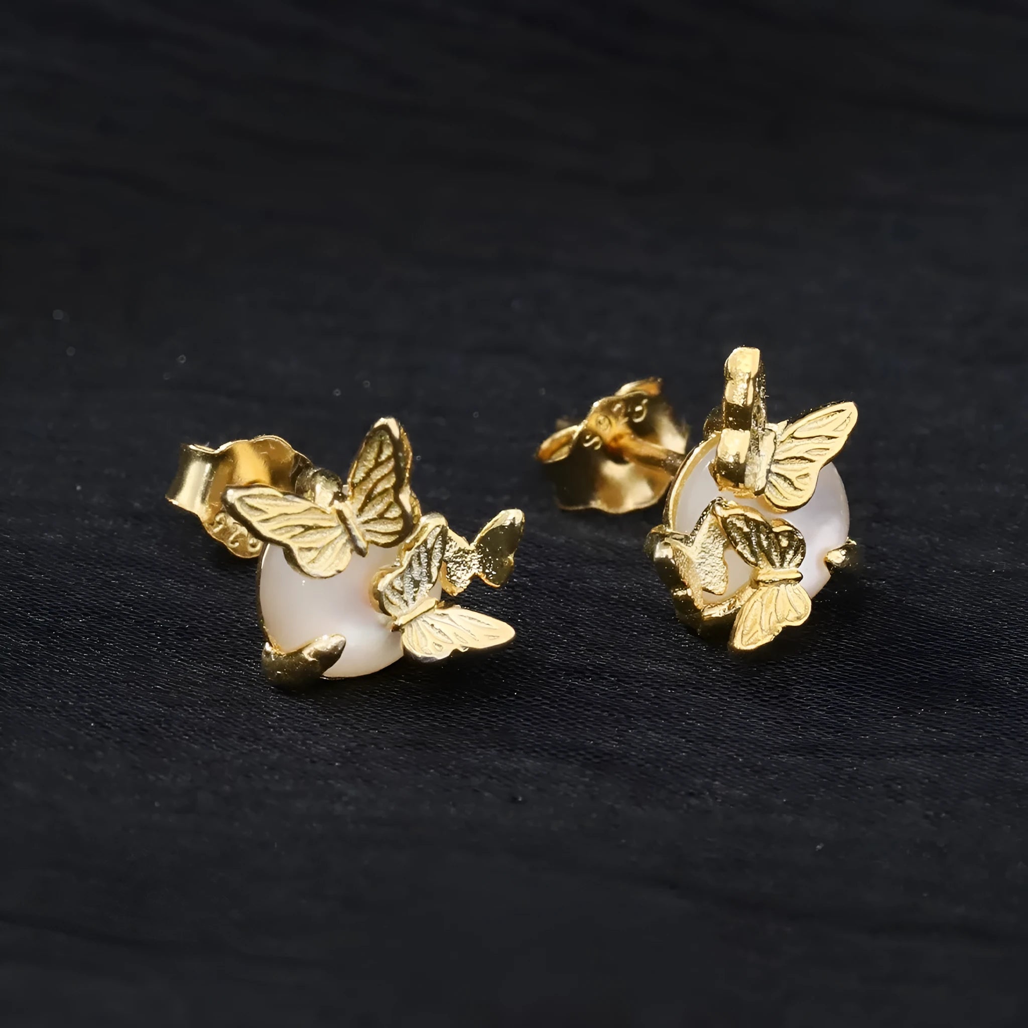 Butterfly cold style ear studs with animal zodiac design in 925 silver with electroplated finish