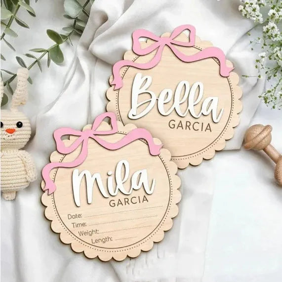 Square wooden baby room ornament personalised with a name, shown in 13cm and 15cm sizes.