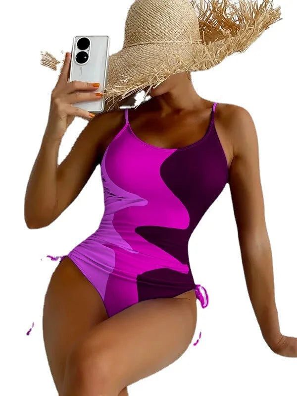 Women's sleeveless one-piece swimsuit with fixed swimming trunks in blue colour
