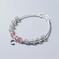 Handmade adjustable bracelet with a natural moonstone centre on a silver-toned chain.