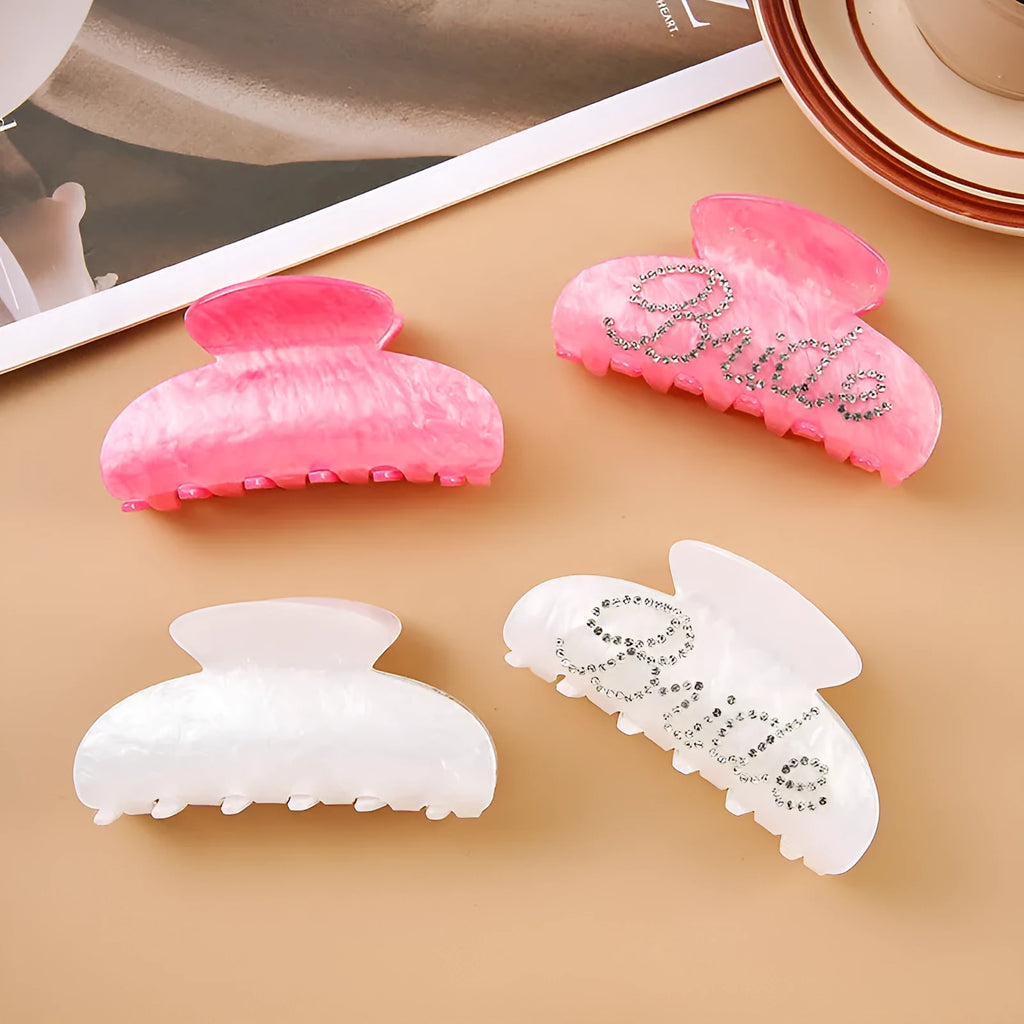 Pink and white 10cm acrylic shower hair clip with spot drill and letter decoration.